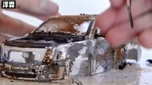 翻新受损的废弃凯迪拉克凯雷德模型车