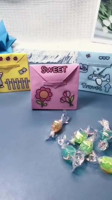 糖果袋子,折几个六一给小朋友们装糖果